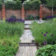 Deck and soft landscaping in a large walled garden