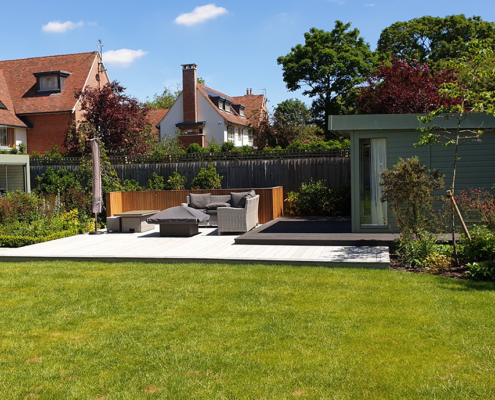 Composite decking with summer house and firepit