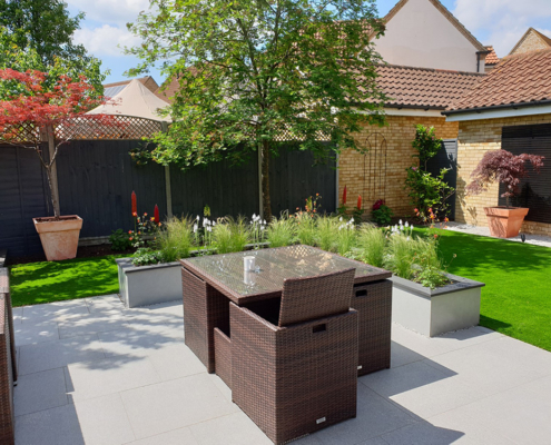 Small modern garden dining area