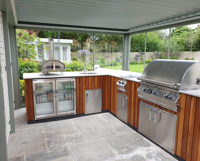 Outdoor Kitchen Cedar clad kitchen with bio climatic pergola