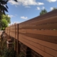 Horizontal wooden baton privacy fence