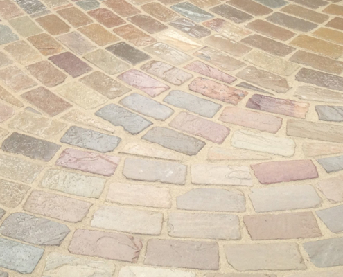 Beige stone paving