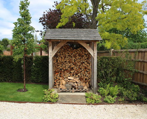 Bespoke garden wood-shed with tiled roof