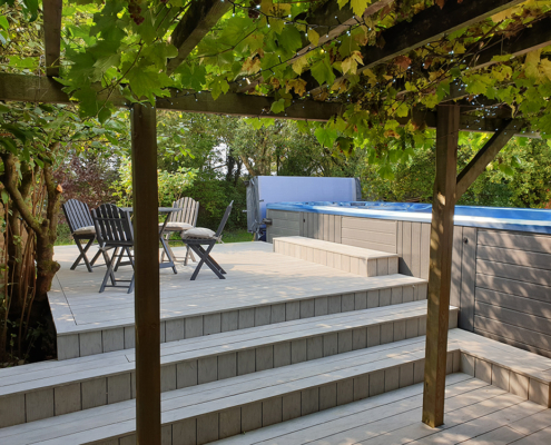 Composite decking and steps to hot tub spa