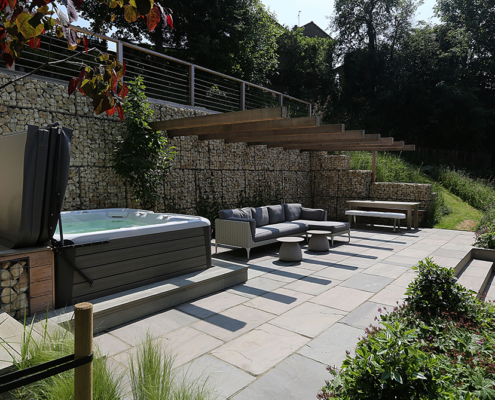 contemporary patio and boulder wall