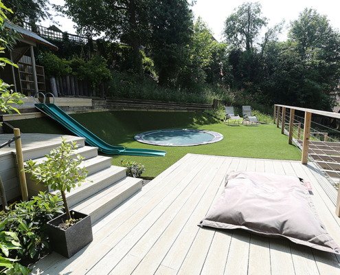 A large contemporary multilevel garden decking and steps