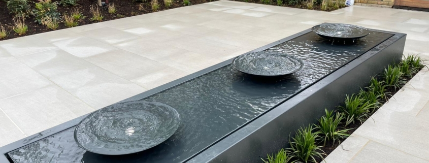 A garden "water table" feature incorporated into patio