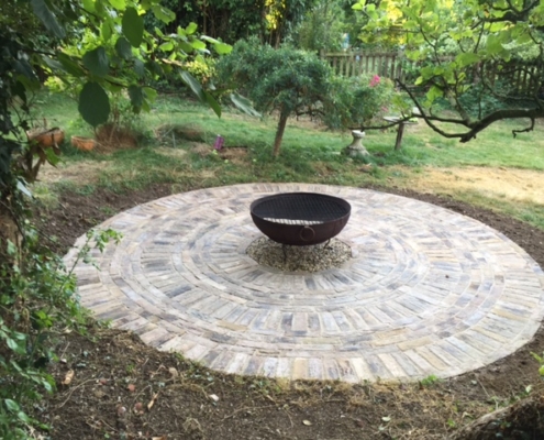 Fire pit circle in clay pavers